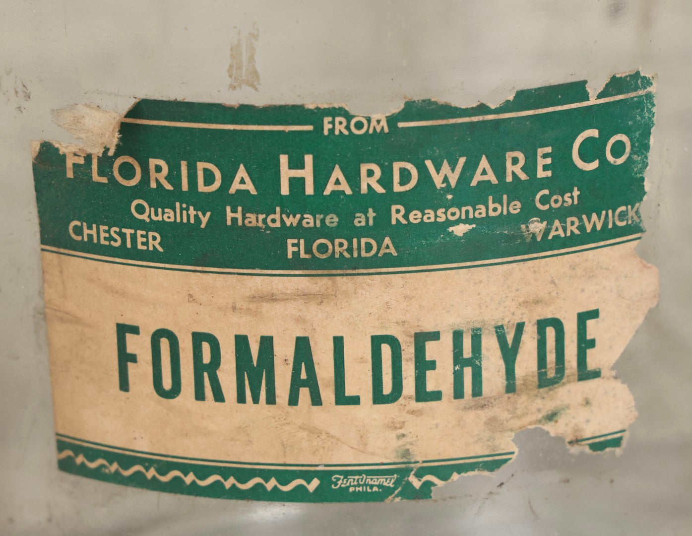 Lot 087 - Pair Of Vintage Clear Glass Jugs With Later-Applied Green “Formaldehyde” Paper Labels From Florida Hardware Co.