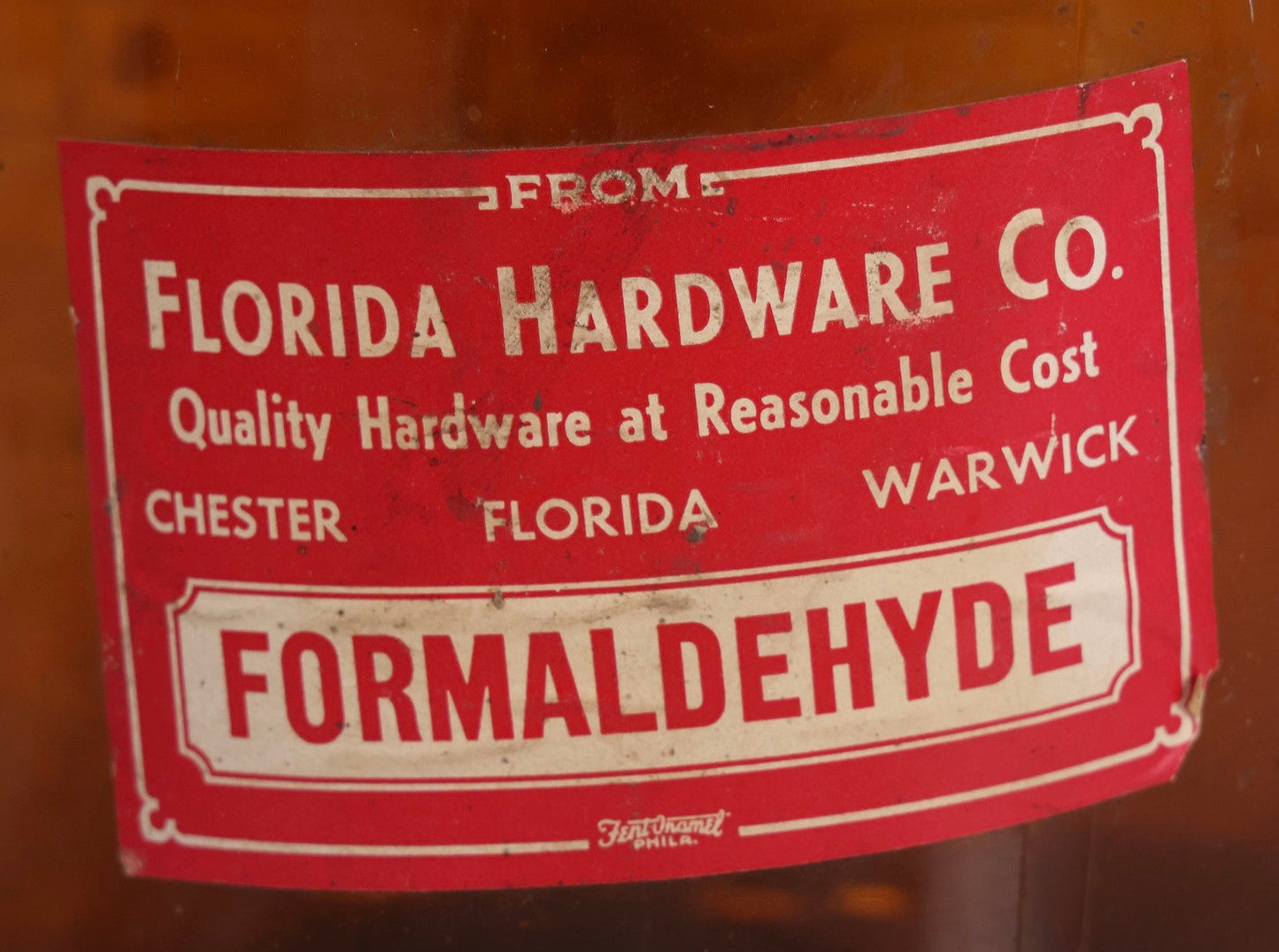 Lot 088 - Pair Of Vintage Amber Glass Jugs With Later-Applied Red “Formaldehyde” Paper Labels From Florida Hardware Co.