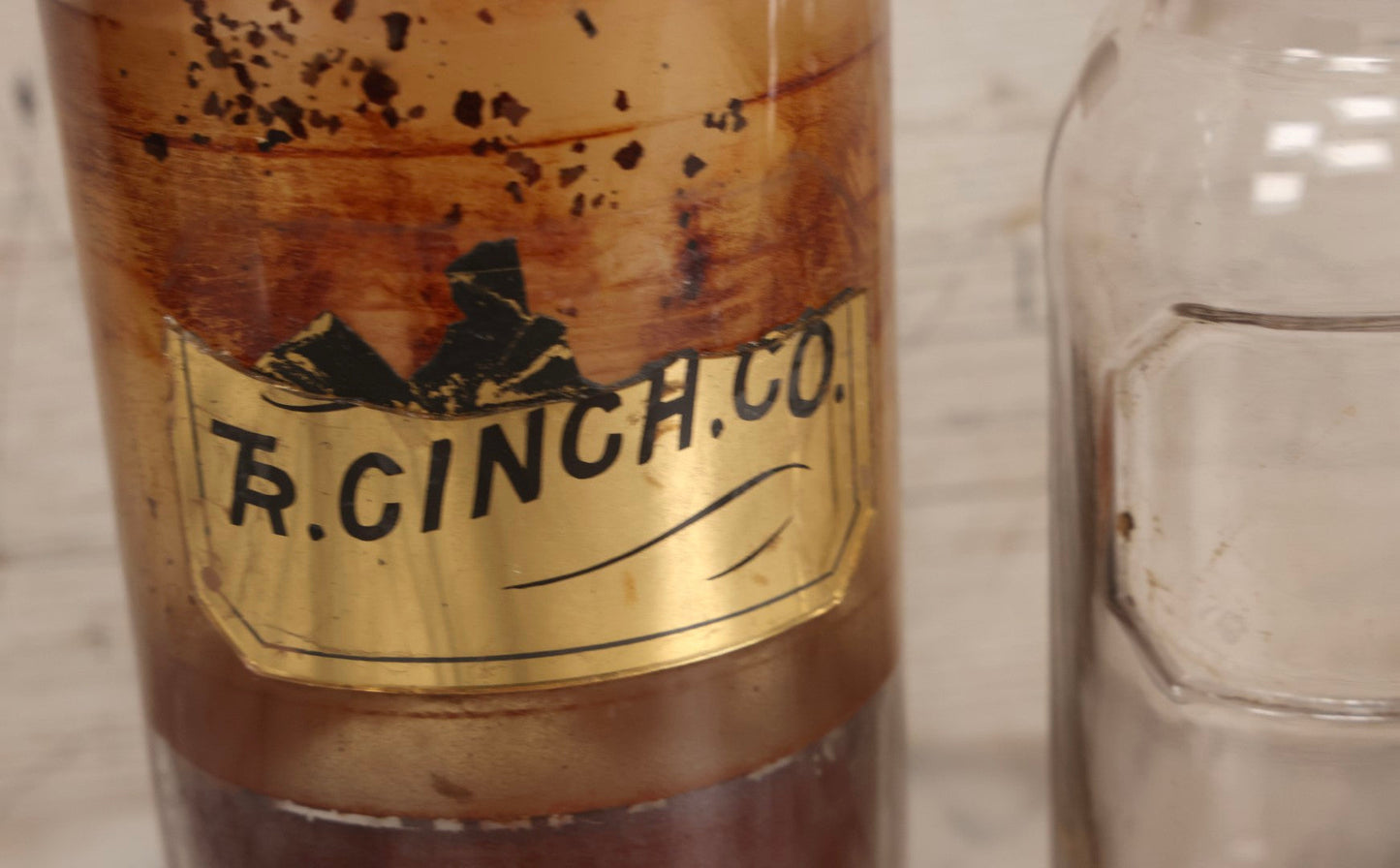 Lot 090 - Trio Of Antique Apothecary Glass Bottles With Ground Stoppers, Mixed Sizes, Worn And Partially Detached Labels, Residue And Staining, Poor As-Found Condition