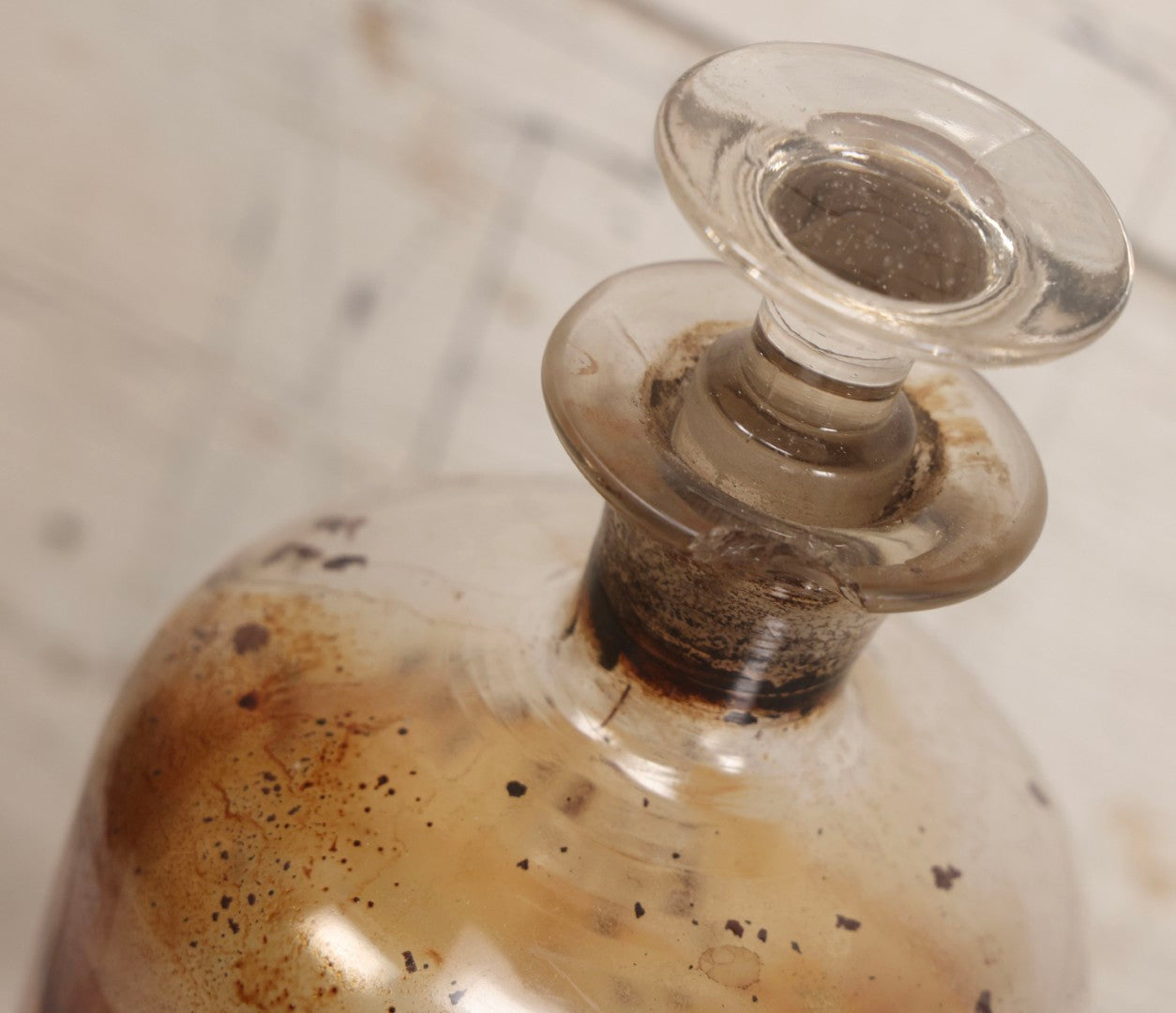 Lot 090 - Trio Of Antique Apothecary Glass Bottles With Ground Stoppers, Mixed Sizes, Worn And Partially Detached Labels, Residue And Staining, Poor As-Found Condition