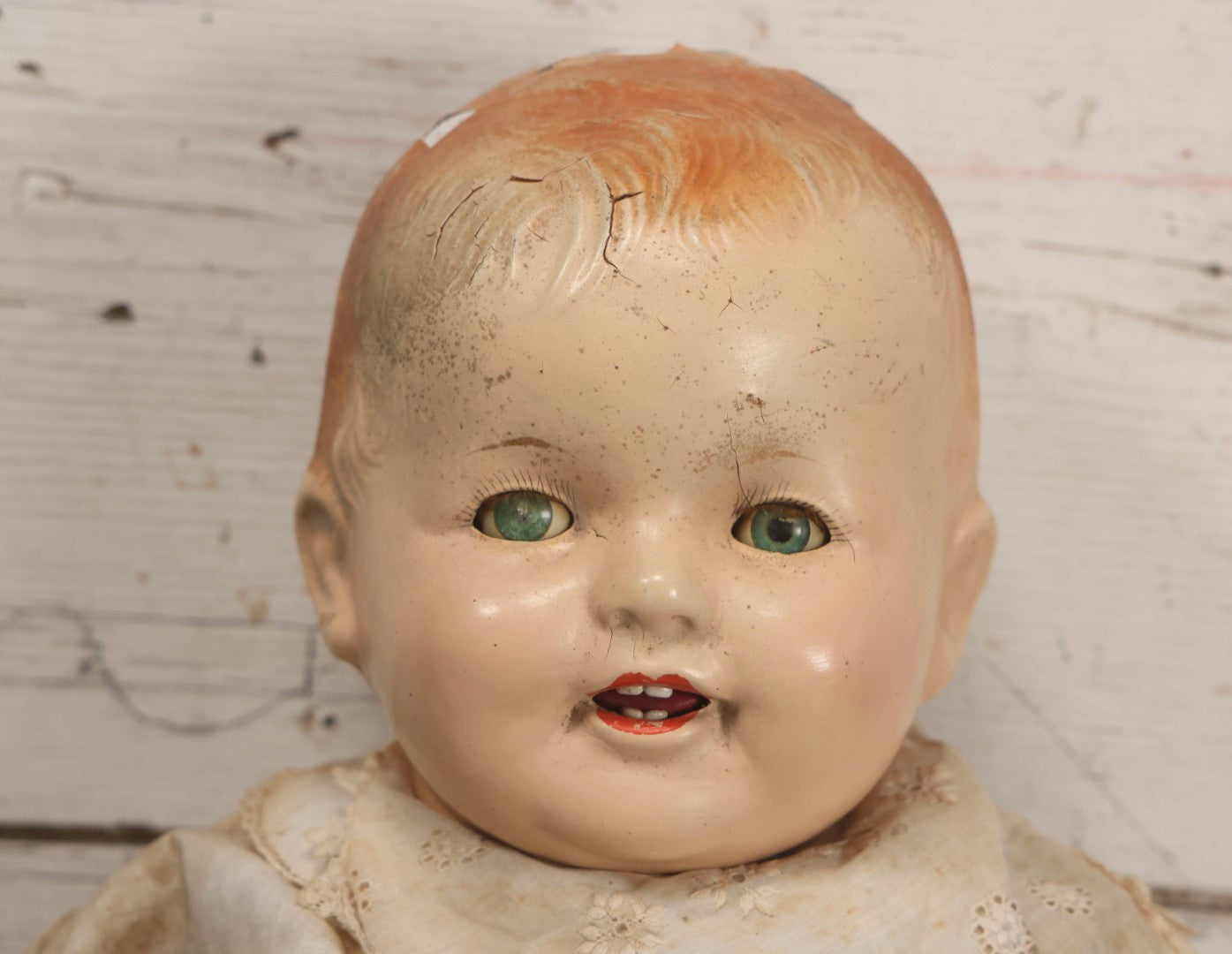 Lot 091 - Vintage Composition Baby Doll With Blue Sleep Eyes, Red Hair, And Original Outfit