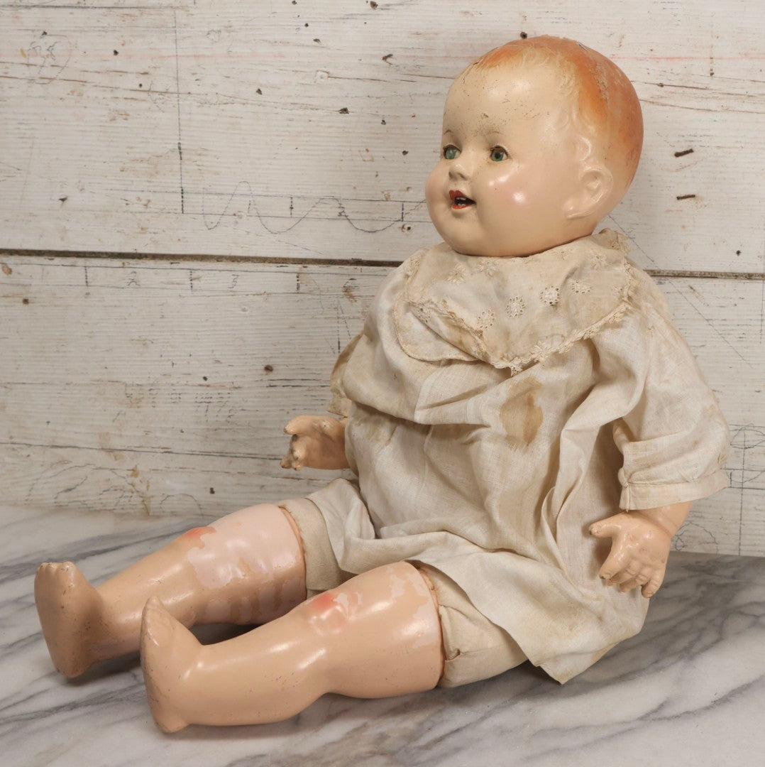 Lot 091 - Vintage Composition Baby Doll With Blue Sleep Eyes, Red Hair, And Original Outfit