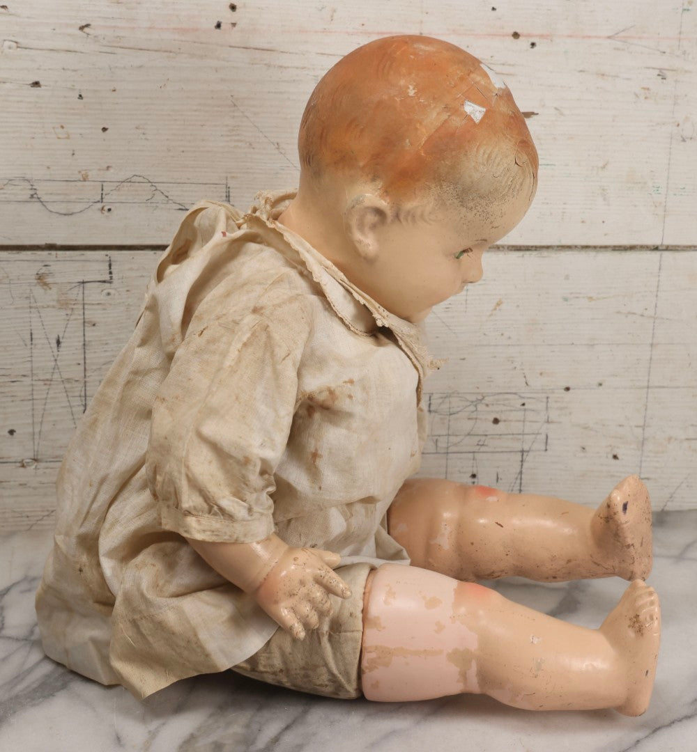 Lot 091 - Vintage Composition Baby Doll With Blue Sleep Eyes, Red Hair, And Original Outfit