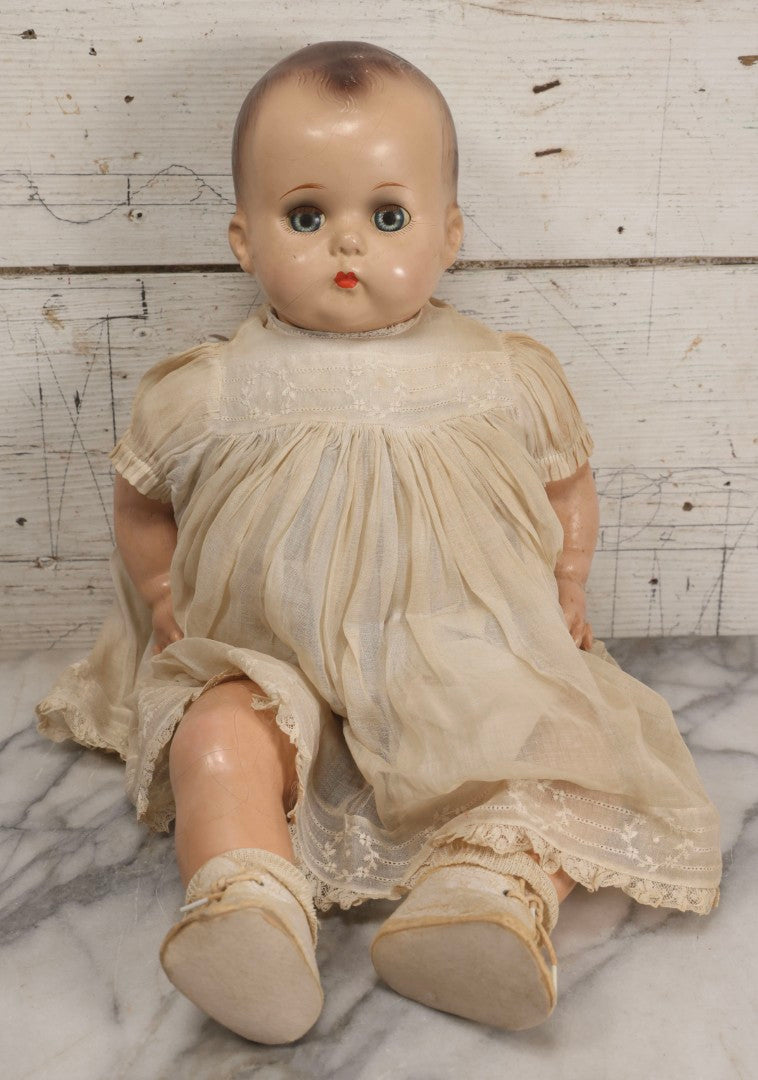 Lot 092 - Vintage Composition Baby Doll With Blue Sleep Eyes, Brown Hair, And Original Outfit, 21" H