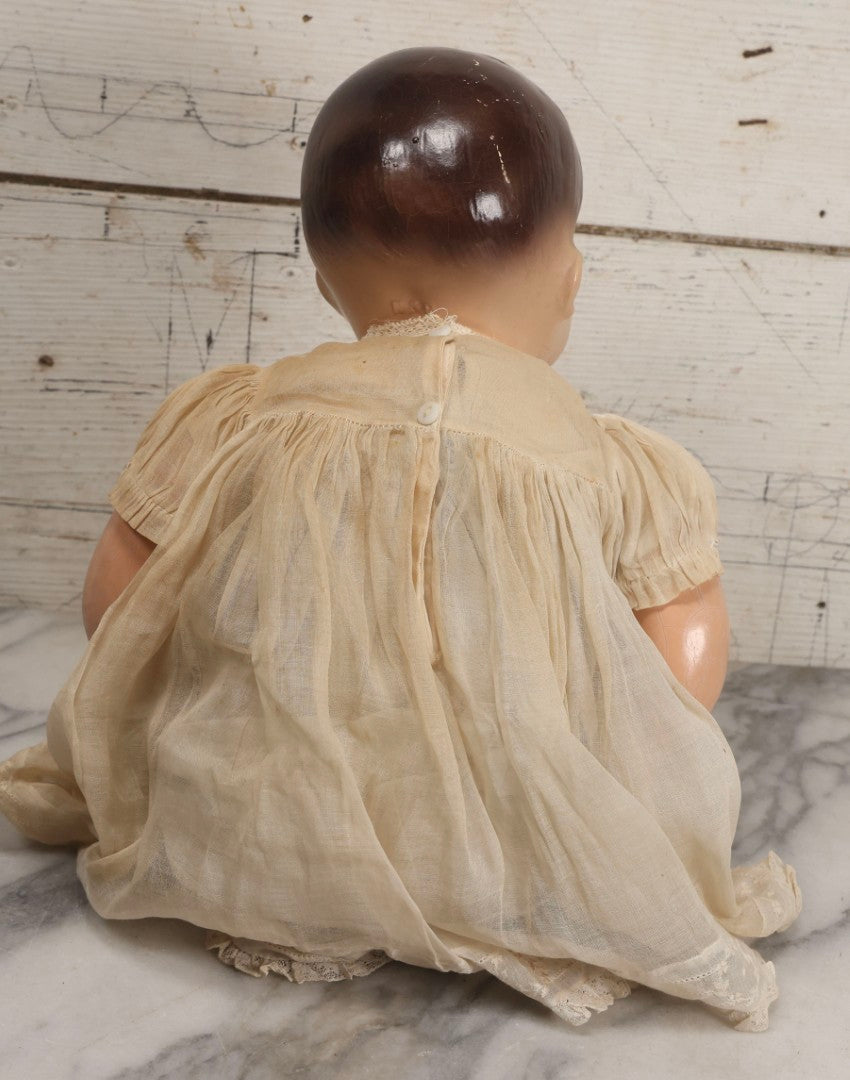 Lot 092 - Vintage Composition Baby Doll With Blue Sleep Eyes, Brown Hair, And Original Outfit