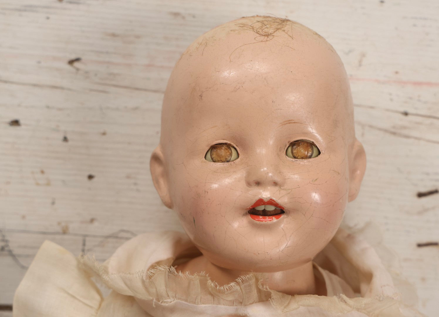 Lot 093 - Vintage Composition Baby Doll With Yellowed Sleep Eyes And Original Outfit, Missing Wig, Damaged Foot
