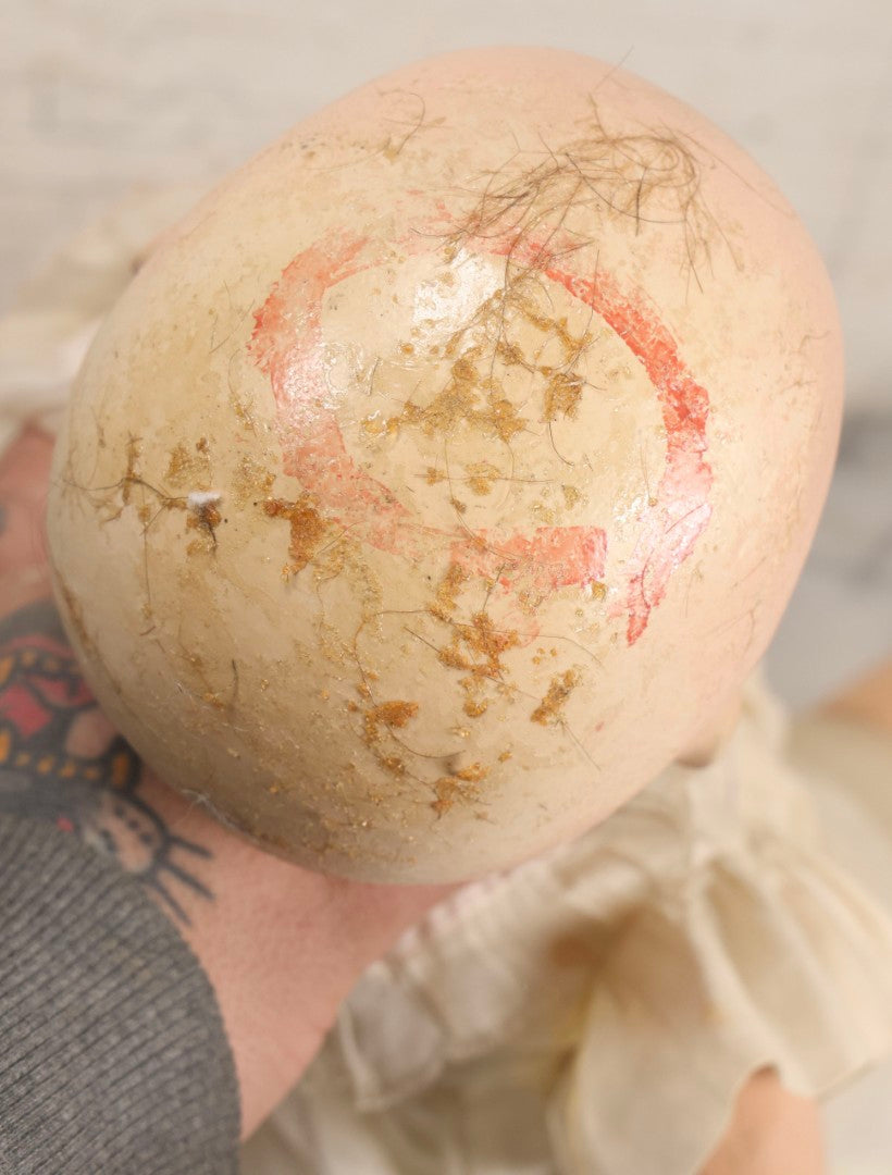 Lot 093 - Vintage Composition Baby Doll With Yellowed Sleep Eyes And Original Outfit, Missing Wig, Damaged Foot