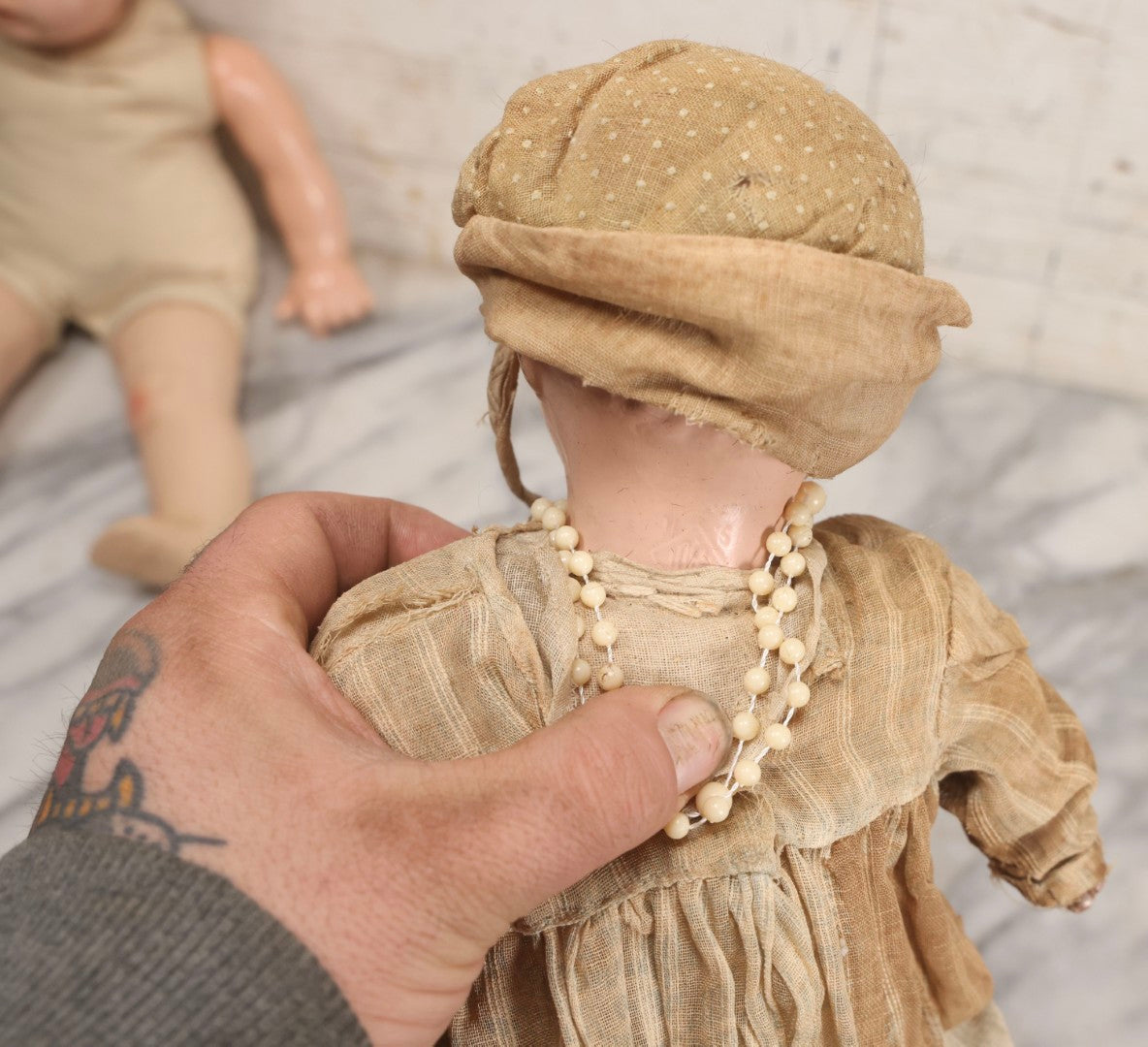 Lot 095 - Trio Of Vintage Composition Baby Dolls Including Pink Dress With Lace Trim, Dirty Dress With Beads, And Sleeveless Undergarment