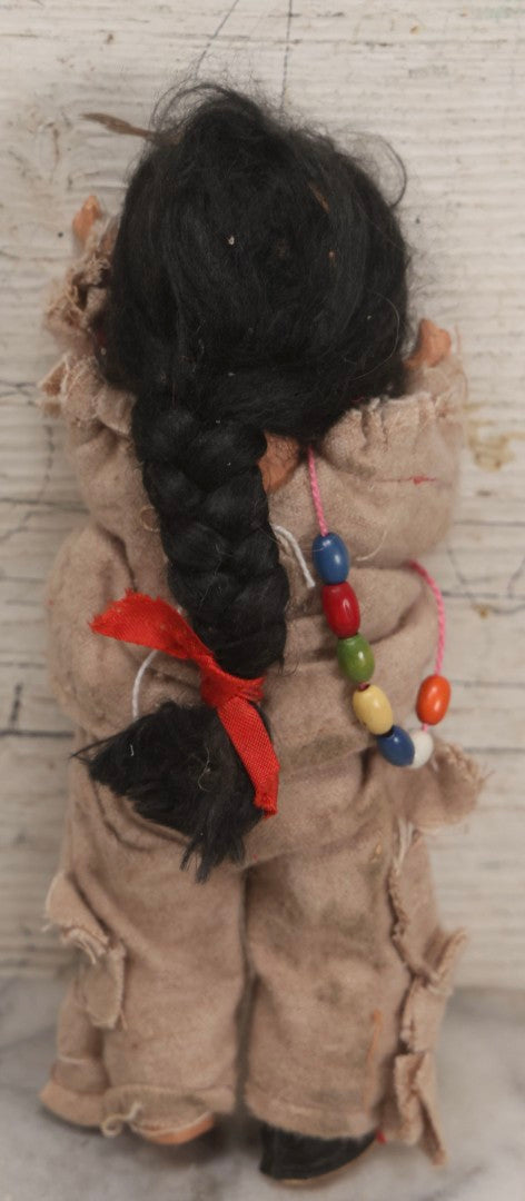 Lot 096 - Grouping Of Five Vintage Composition Dolls Including Floral Dress Doll, Plaid Dress Doll, Blue Check Dress Doll With Bonnet, Brown Composition Baby, And Small Jointed Doll