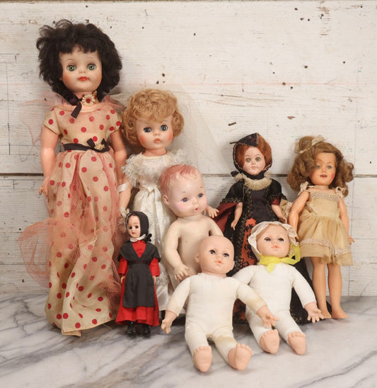 Lot 097 - Grouping Of Eight Vintage And Modern Plastic Dolls In Assorted Sizes And Outfits