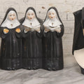 Lot 100 - Trio Of Vintage Porcelain And Ceramic Nun Items Including Music Box, M.J. Hummel Goebel Nun Bust (West Germany, 1978), And Banjo-Playing Nun Figurine