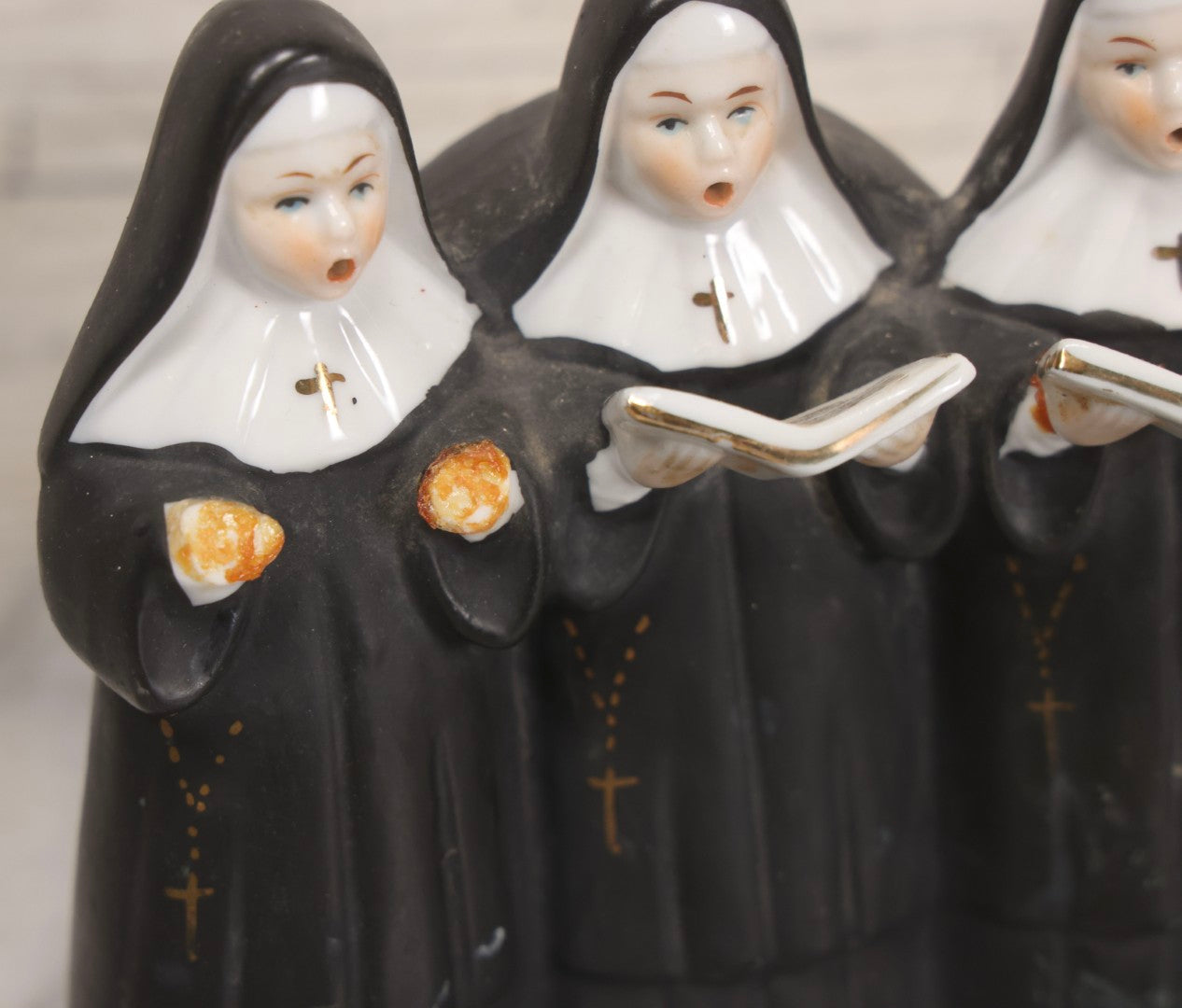 Lot 100 - Trio Of Vintage Porcelain And Ceramic Nun Items Including Music Box, M.J. Hummel Goebel Nun Bust (West Germany, 1978), And Banjo-Playing Nun Figurine