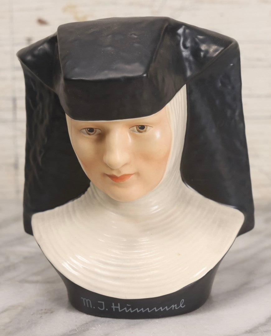 Lot 100 - Trio Of Vintage Porcelain And Ceramic Nun Items Including Music Box, M.J. Hummel Goebel Nun Bust (West Germany, 1978), And Banjo-Playing Nun Figurine