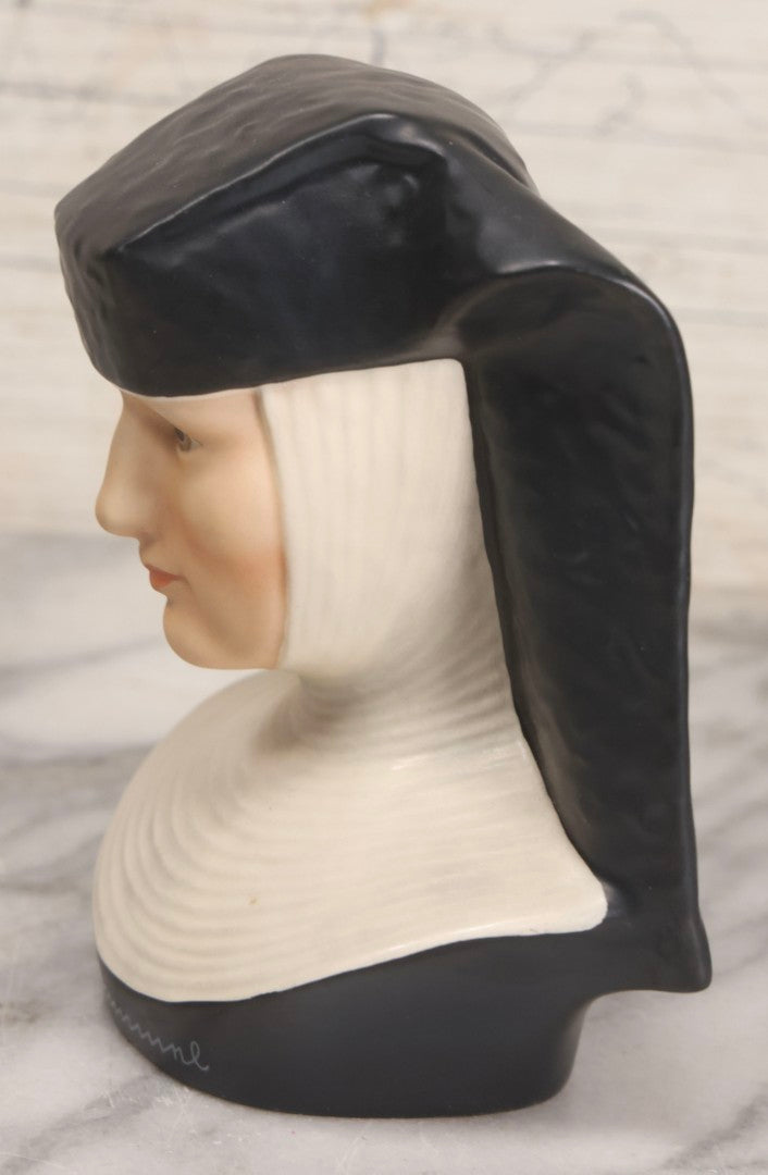 Lot 100 - Trio Of Vintage Porcelain And Ceramic Nun Items Including Music Box, M.J. Hummel Goebel Nun Bust (West Germany, 1978), And Banjo-Playing Nun Figurine