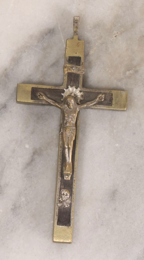 Lot 111 - Grouping Of Seven Vintage Crosses In Wood, Metal, And Plastic Including Two Golgotha Pectoral Crucifixes With Skull And Crossbones Motif
