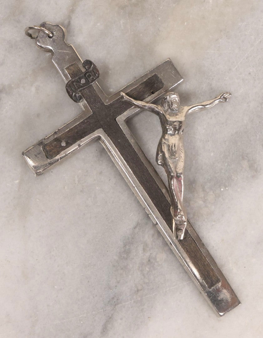 Lot 111 - Grouping Of Seven Vintage Crosses In Wood, Metal, And Plastic Including Two Golgotha Pectoral Crucifixes With Skull And Crossbones Motif