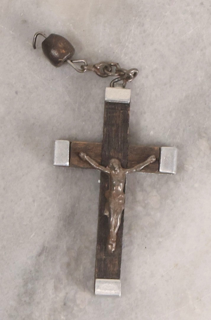 Lot 111 - Grouping Of Seven Vintage Crosses In Wood, Metal, And Plastic Including Two Golgotha Pectoral Crucifixes With Skull And Crossbones Motif