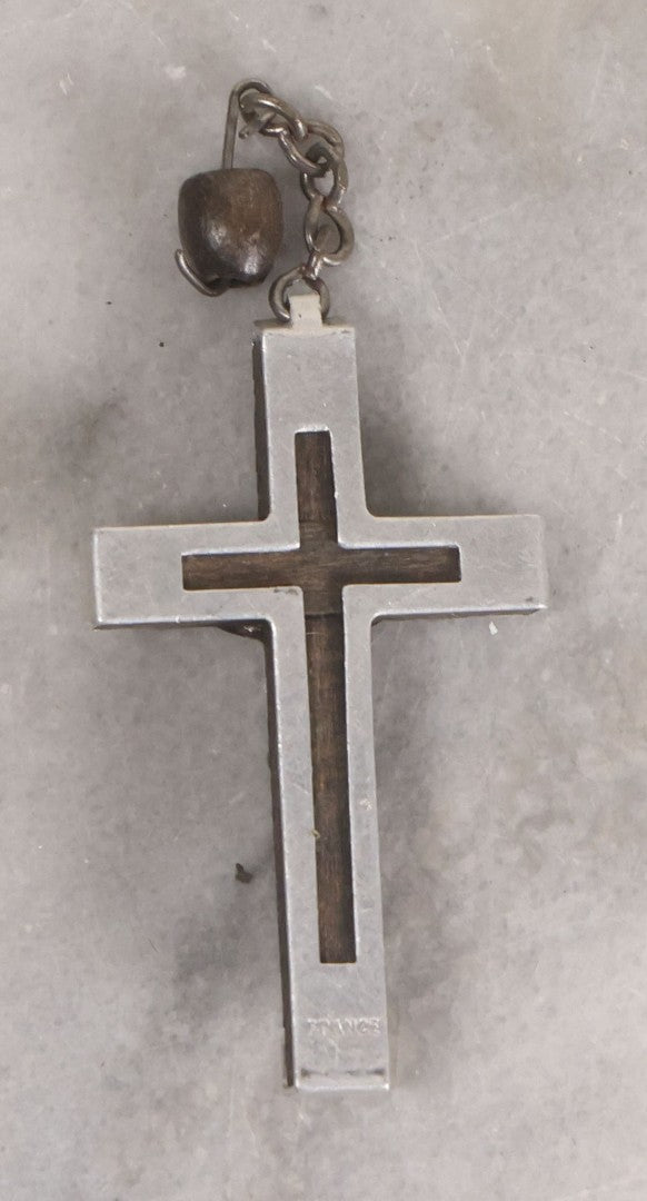 Lot 111 - Grouping Of Seven Vintage Crosses In Wood, Metal, And Plastic Including Two Golgotha Pectoral Crucifixes With Skull And Crossbones Motif