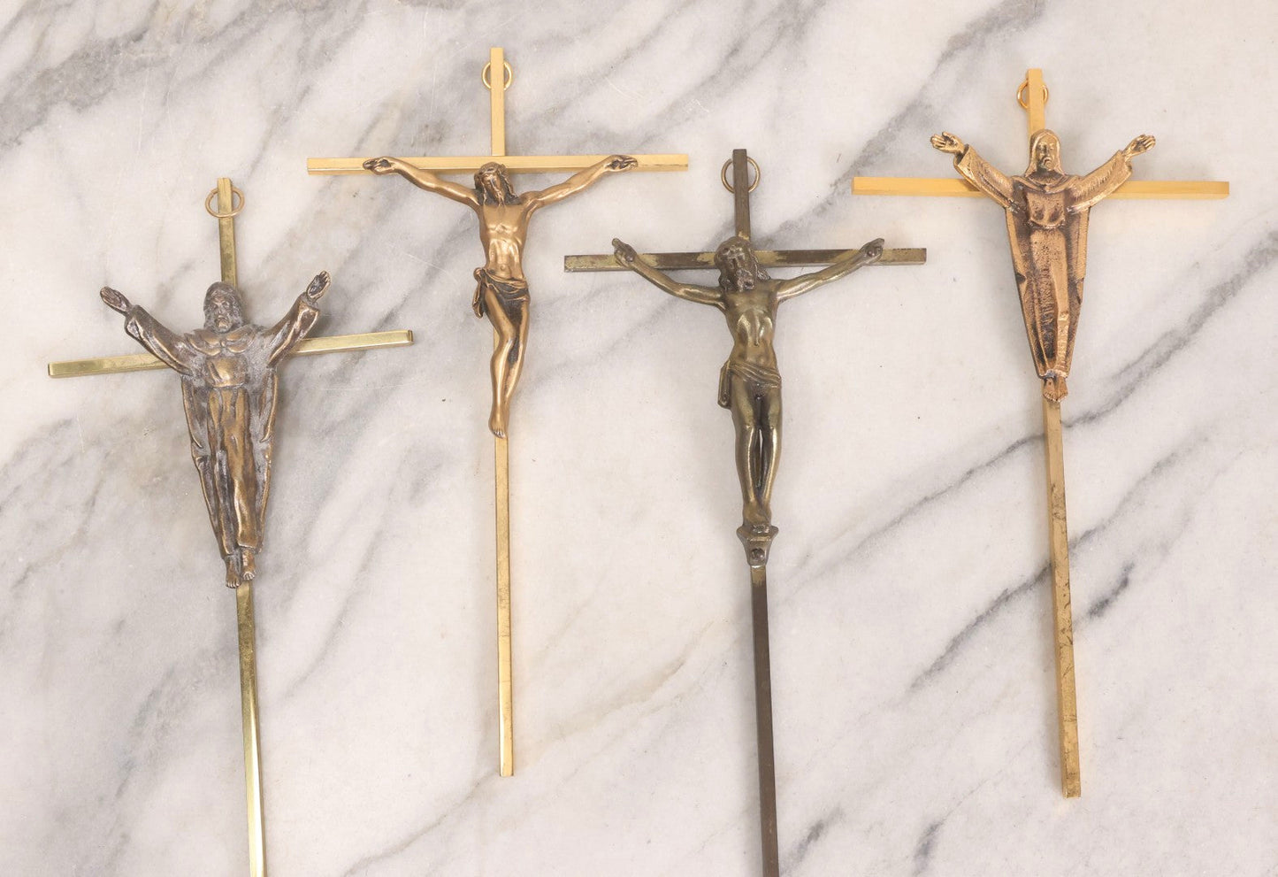 Lot 112 - Grouping Of Four Modern And Vintage Metal Crucifixes With Mixed Finishes