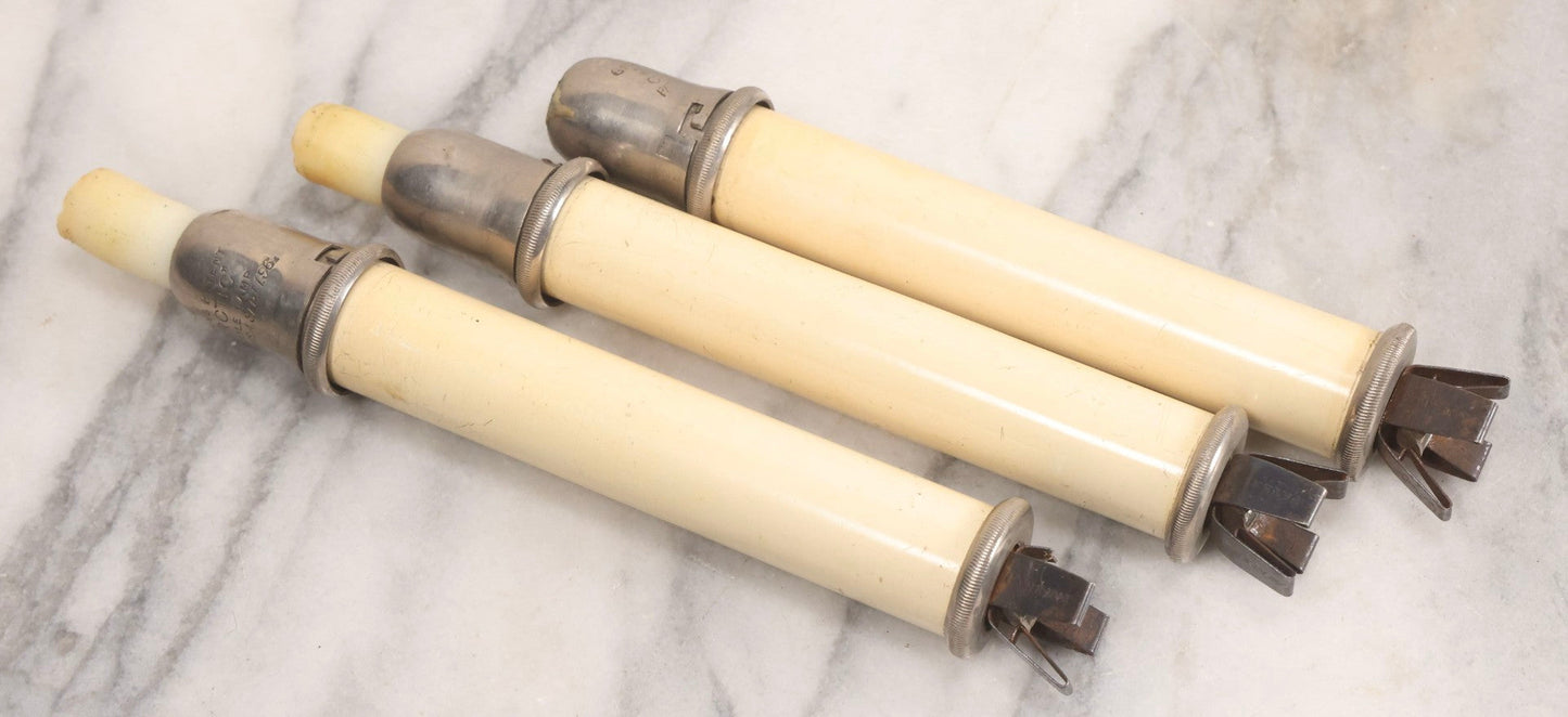 Lot 120 - Trio Of Antique Green's Patent "Arctic" Spring-Loaded Candle Lamp Holders