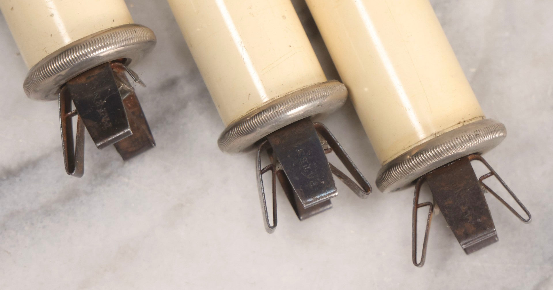 Lot 120 - Trio Of Antique Green's Patent "Arctic" Spring-Loaded Candle Lamp Holders