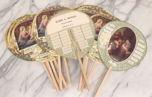 Lot 124 - Grouping Of 11 Vintage Funeral Hand Fans Advertising Elmer A. Arnold Funeral Home, Burdett, New York, Printed By Messenger Publishing Co. And Messenger Corporation, 1927 & 1932
