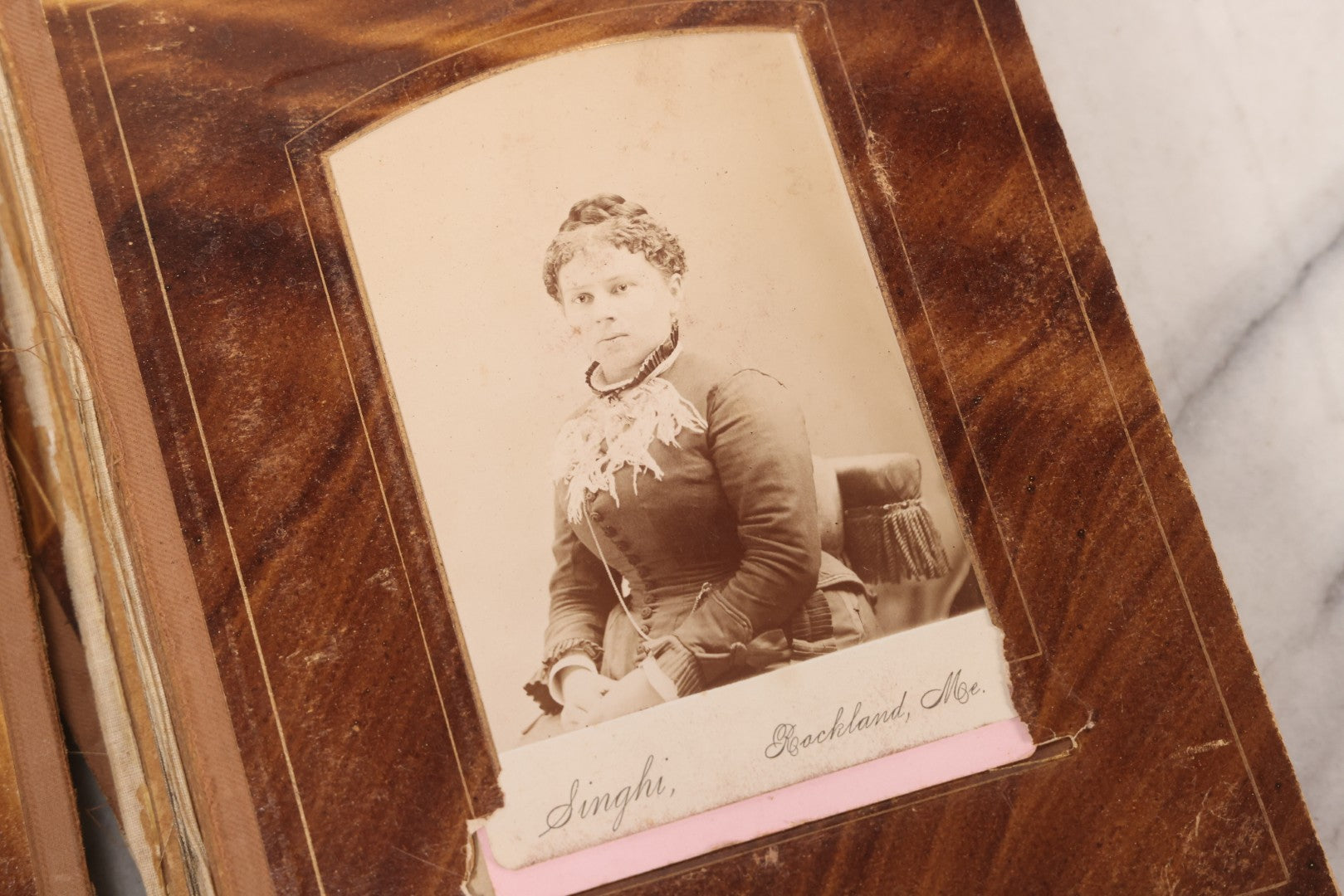 Lot 127 - Antique Brown Leather Covered Cabinet Card Family Photograph Album With 30+ Portrait Images Including Man In Fraternal Or Military Uniform, Men, Women, And Children, Note Binding Loose, Craft Grade