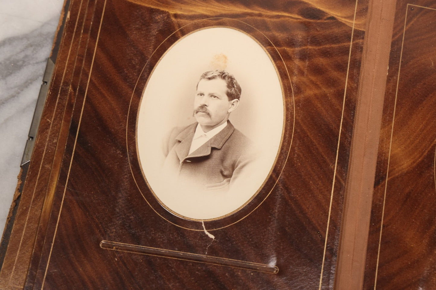 Lot 127 - Antique Brown Leather Covered Cabinet Card Family Photograph Album With 30+ Portrait Images Including Man In Fraternal Or Military Uniform, Men, Women, And Children, Note Binding Loose, Craft Grade