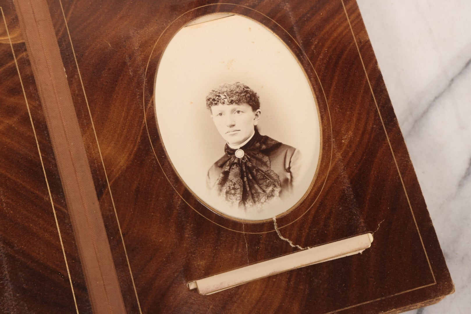 Lot 127 - Antique Brown Leather Covered Cabinet Card Family Photograph Album With 30+ Portrait Images Including Man In Fraternal Or Military Uniform, Men, Women, And Children, Note Binding Loose, Craft Grade