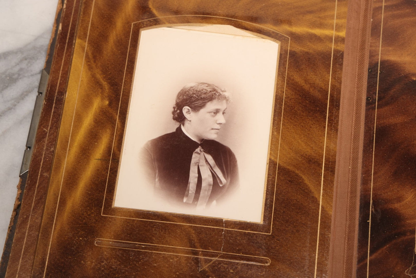 Lot 127 - Antique Brown Leather Covered Cabinet Card Family Photograph Album With 30+ Portrait Images Including Man In Fraternal Or Military Uniform, Men, Women, And Children, Note Binding Loose, Craft Grade