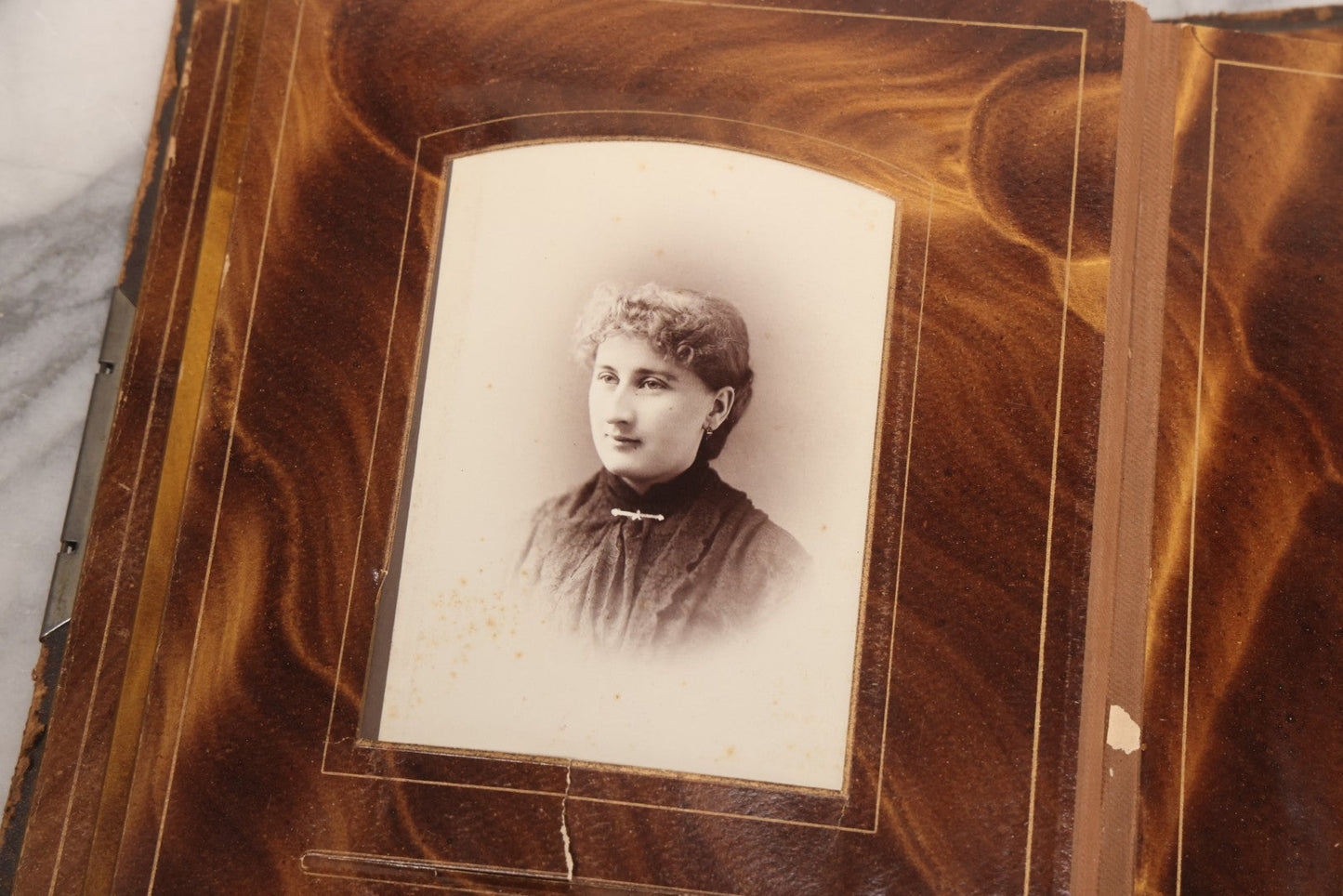 Lot 127 - Antique Brown Leather Covered Cabinet Card Family Photograph Album With 30+ Portrait Images Including Man In Fraternal Or Military Uniform, Men, Women, And Children, Note Binding Loose, Craft Grade