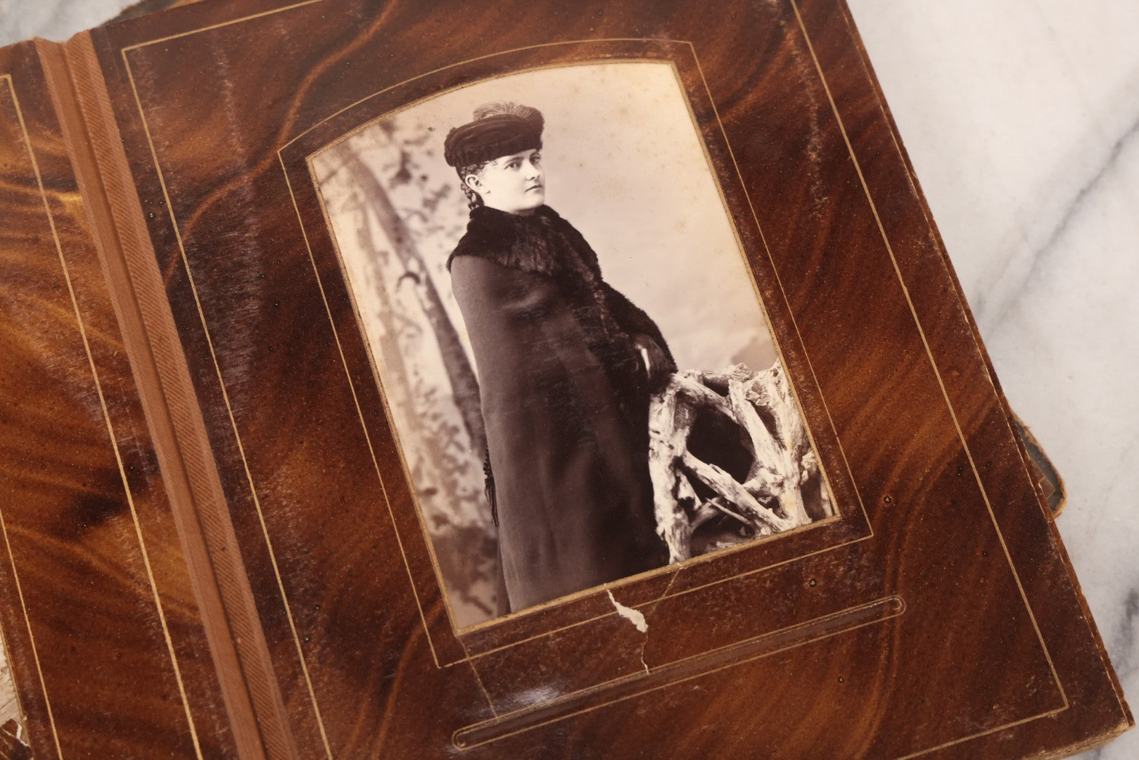 Lot 127 - Antique Brown Leather Covered Cabinet Card Family Photograph Album With 30+ Portrait Images Including Man In Fraternal Or Military Uniform, Men, Women, And Children, Note Binding Loose, Craft Grade