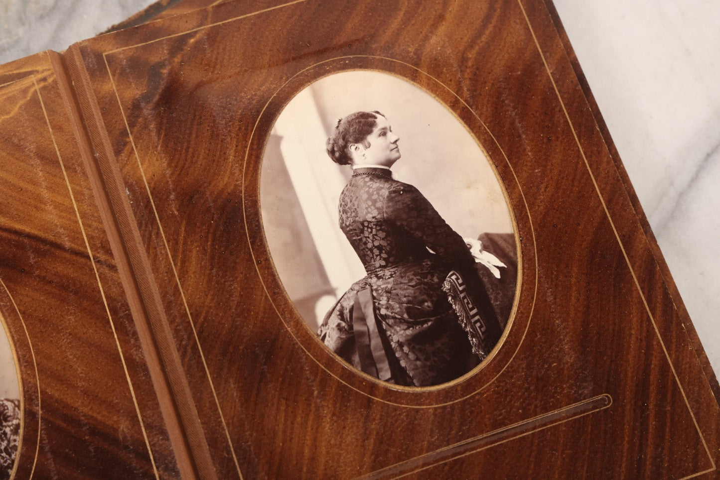 Lot 127 - Antique Brown Leather Covered Cabinet Card Family Photograph Album With 30+ Portrait Images Including Man In Fraternal Or Military Uniform, Men, Women, And Children, Note Binding Loose, Craft Grade