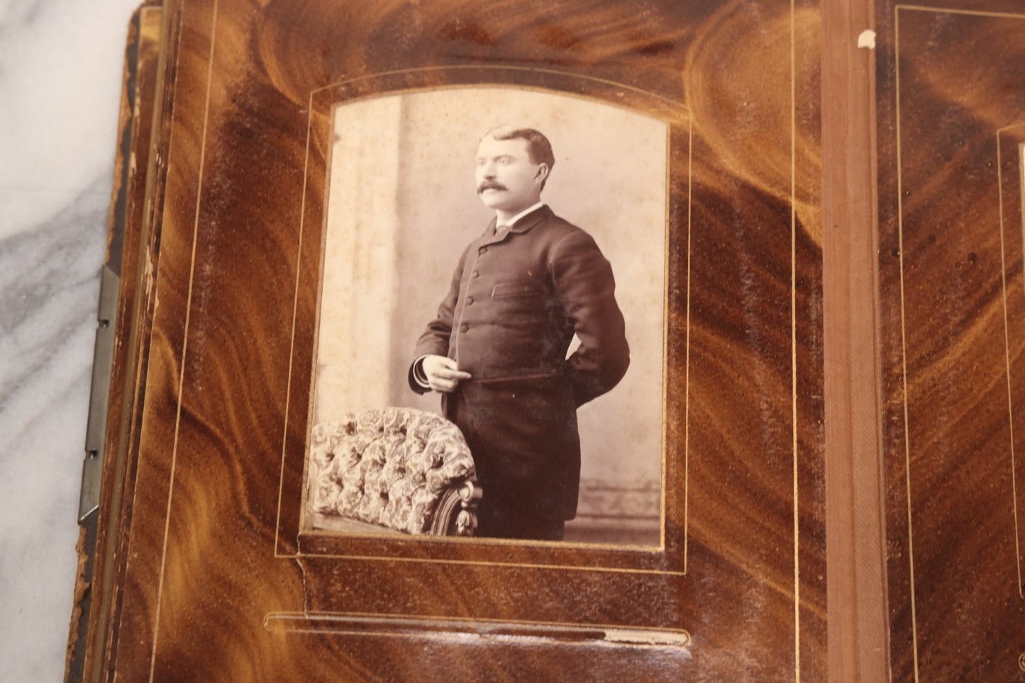 Lot 127 - Antique Brown Leather Covered Cabinet Card Family Photograph Album With 30+ Portrait Images Including Man In Fraternal Or Military Uniform, Men, Women, And Children, Note Binding Loose, Craft Grade