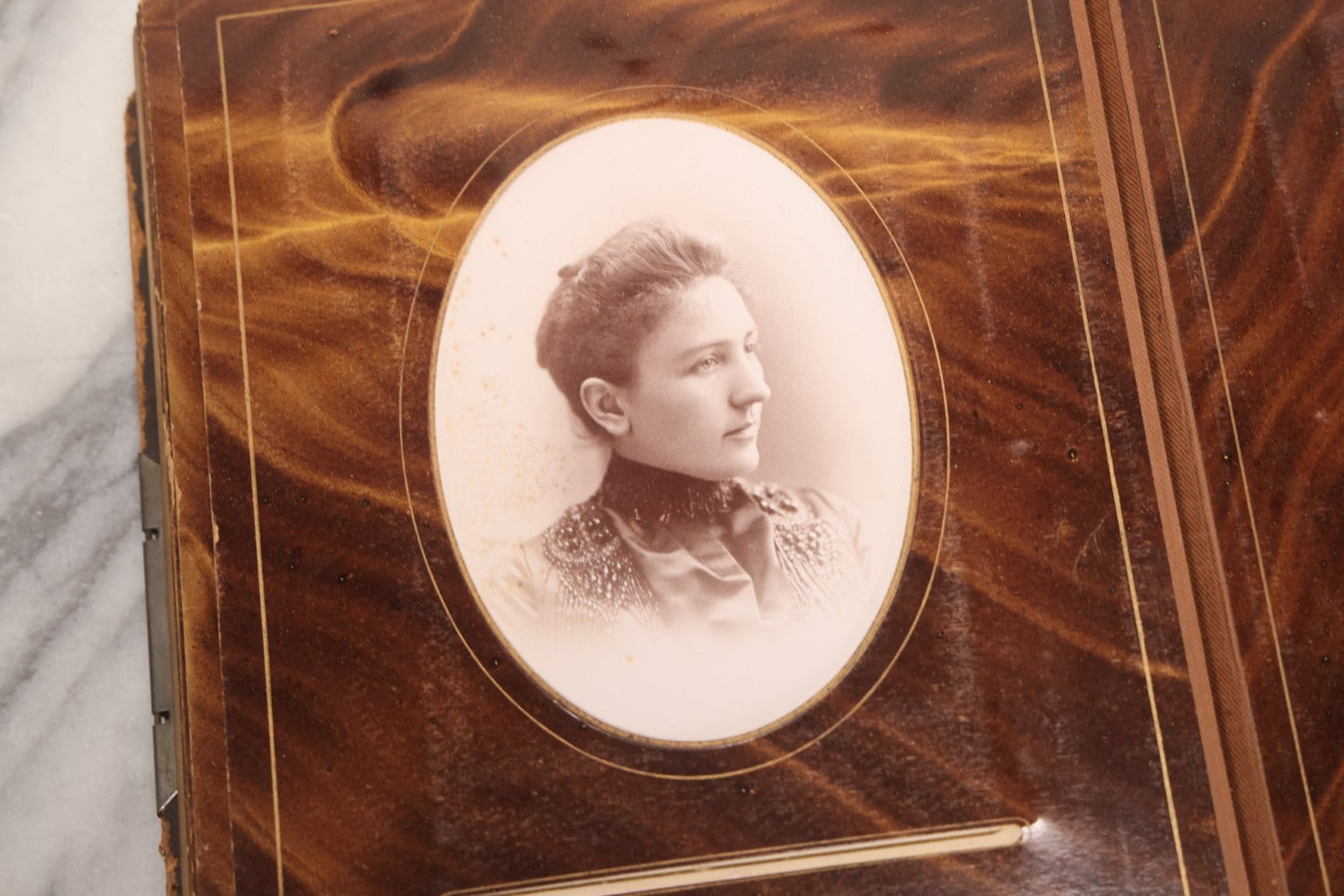 Lot 127 - Antique Brown Leather Covered Cabinet Card Family Photograph Album With 30+ Portrait Images Including Man In Fraternal Or Military Uniform, Men, Women, And Children, Note Binding Loose, Craft Grade
