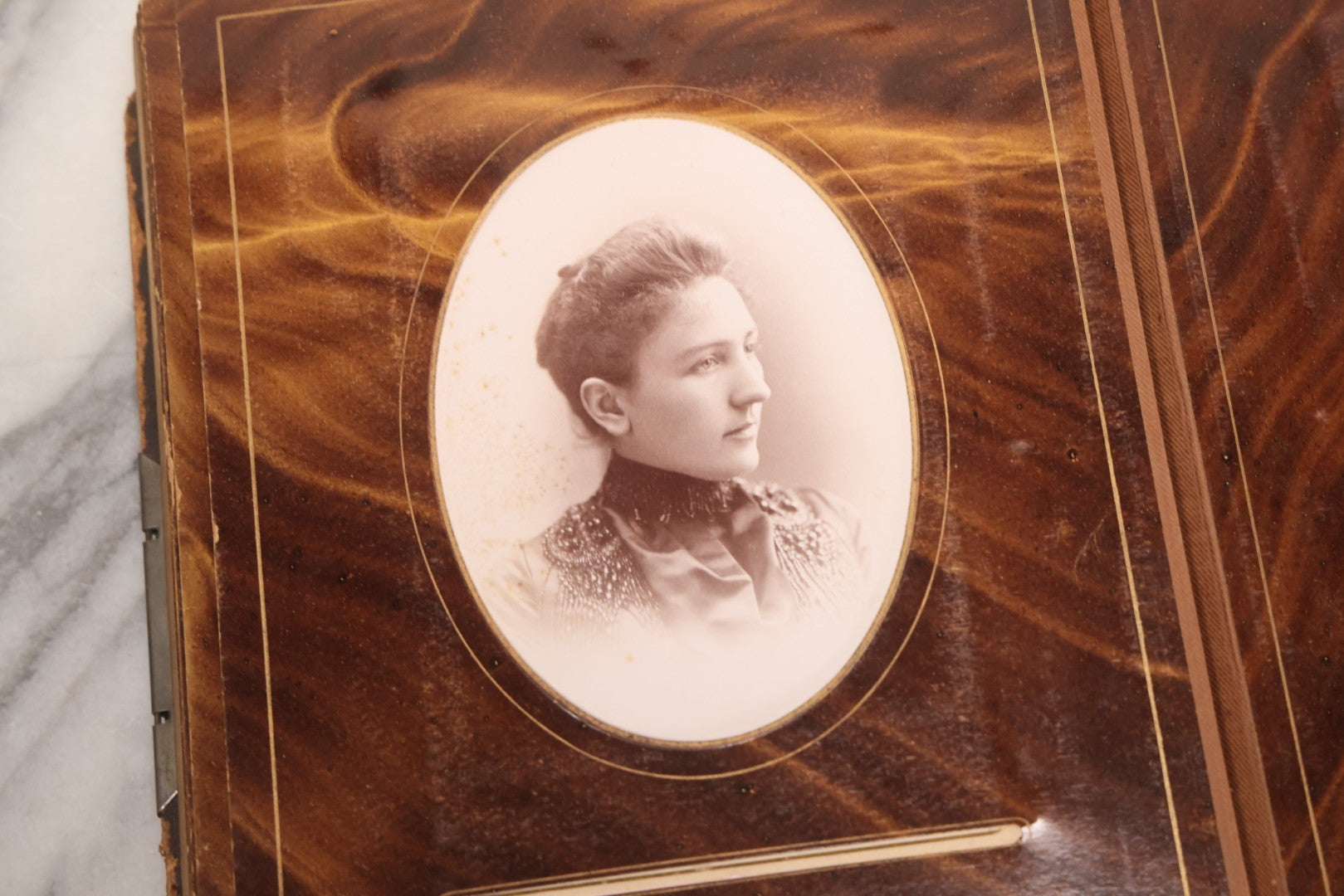 Lot 127 - Antique Brown Leather Covered Cabinet Card Family Photograph Album With 30+ Portrait Images Including Man In Fraternal Or Military Uniform, Men, Women, And Children, Note Binding Loose, Craft Grade