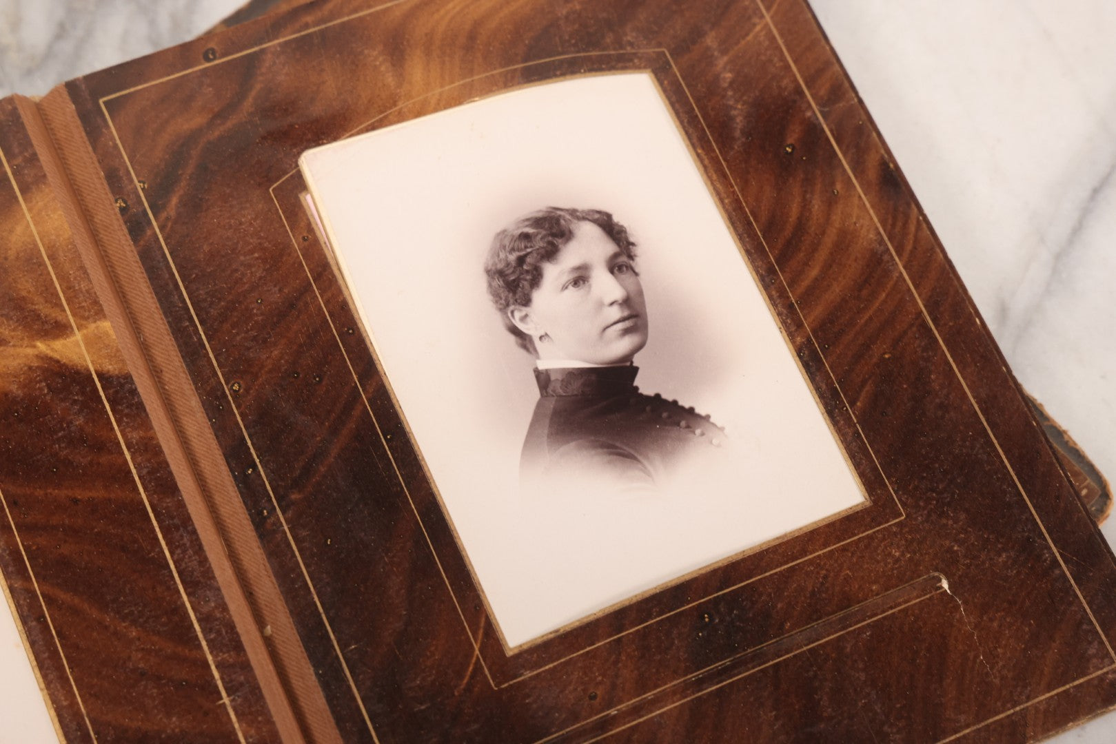 Lot 127 - Antique Brown Leather Covered Cabinet Card Family Photograph Album With 30+ Portrait Images Including Man In Fraternal Or Military Uniform, Men, Women, And Children, Note Binding Loose, Craft Grade