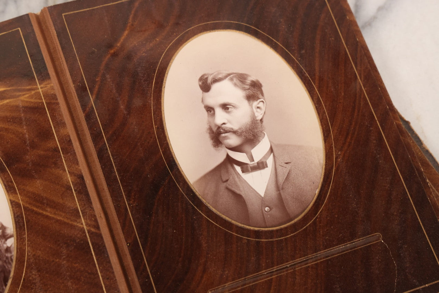 Lot 127 - Antique Brown Leather Covered Cabinet Card Family Photograph Album With 30+ Portrait Images Including Man In Fraternal Or Military Uniform, Men, Women, And Children, Note Binding Loose, Craft Grade