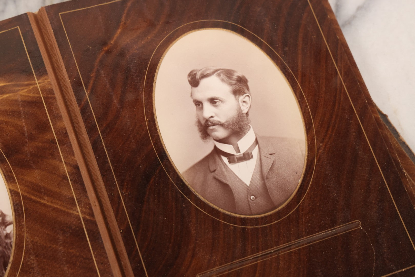 Lot 127 - Antique Brown Leather Covered Cabinet Card Family Photograph Album With 30+ Portrait Images Including Man In Fraternal Or Military Uniform, Men, Women, And Children, Note Binding Loose, Craft Grade