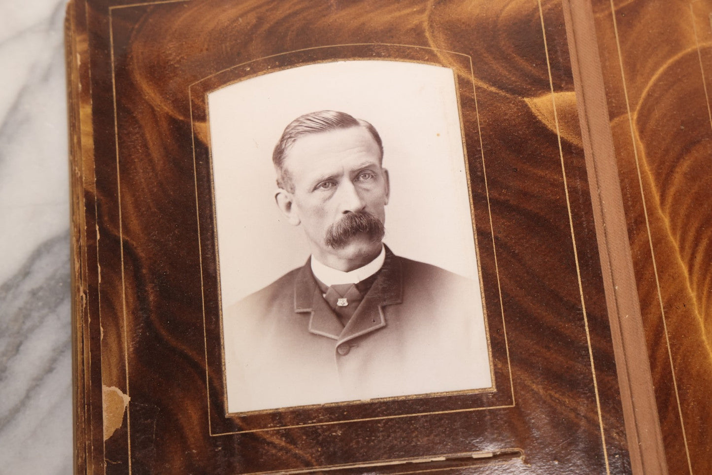 Lot 127 - Antique Brown Leather Covered Cabinet Card Family Photograph Album With 30+ Portrait Images Including Man In Fraternal Or Military Uniform, Men, Women, And Children, Note Binding Loose, Craft Grade