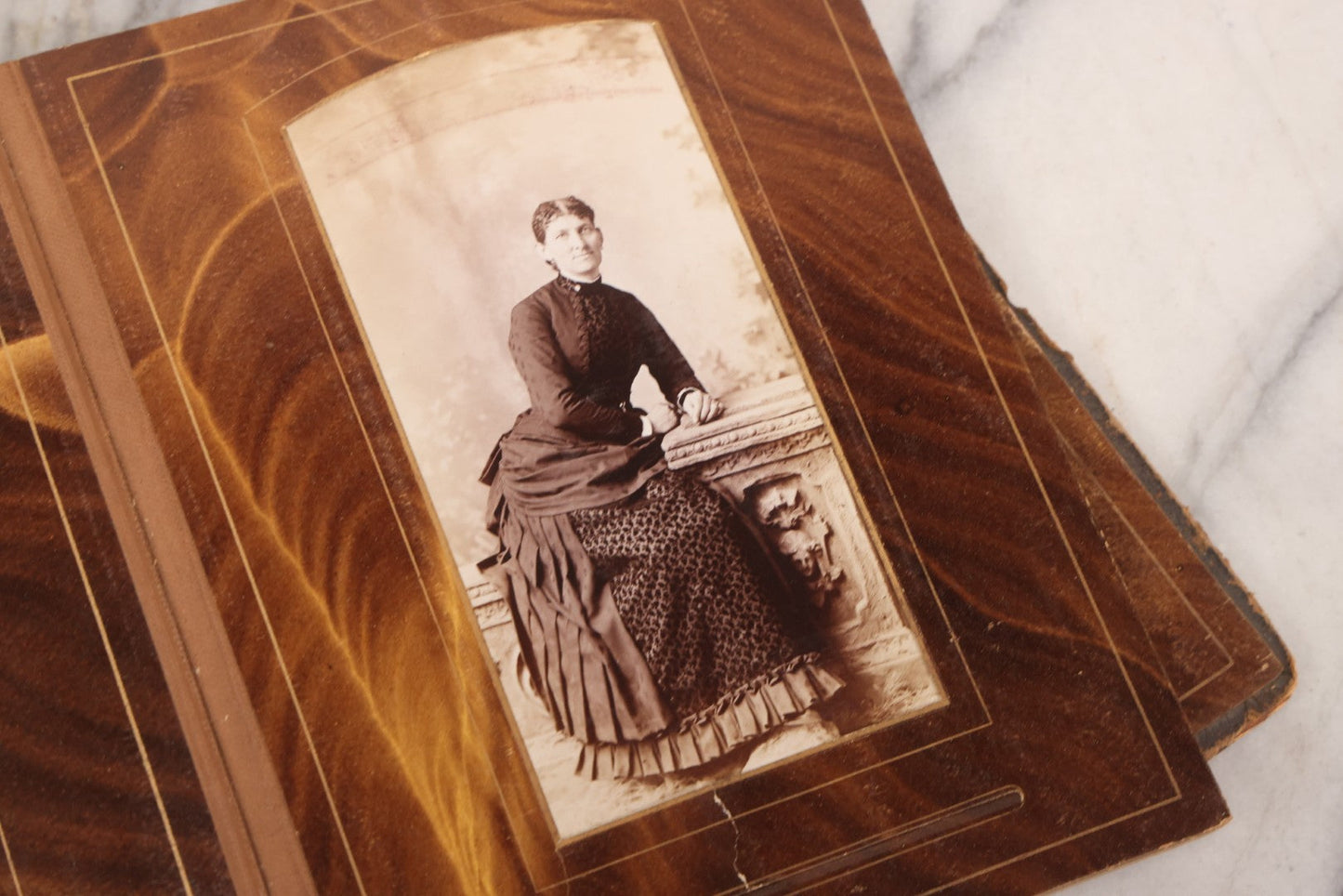 Lot 127 - Antique Brown Leather Covered Cabinet Card Family Photograph Album With 30+ Portrait Images Including Man In Fraternal Or Military Uniform, Men, Women, And Children, Note Binding Loose, Craft Grade
