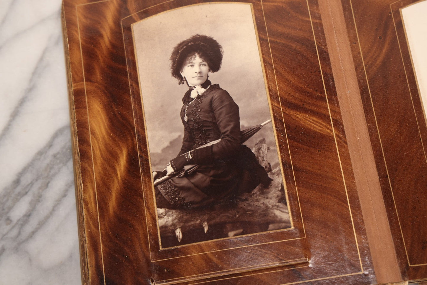 Lot 127 - Antique Brown Leather Covered Cabinet Card Family Photograph Album With 30+ Portrait Images Including Man In Fraternal Or Military Uniform, Men, Women, And Children, Note Binding Loose, Craft Grade