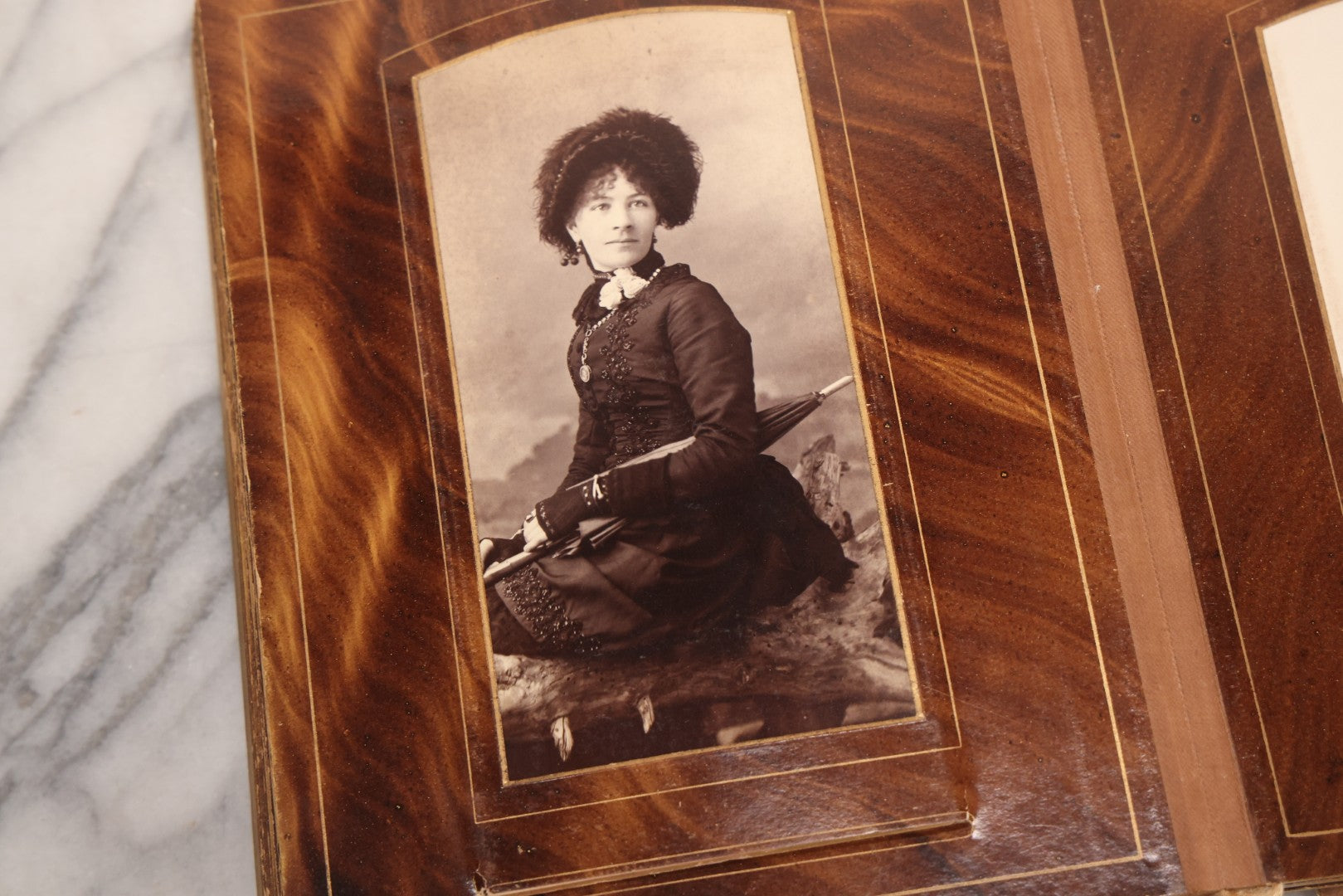 Lot 127 - Antique Brown Leather Covered Cabinet Card Family Photograph Album With 30+ Portrait Images Including Man In Fraternal Or Military Uniform, Men, Women, And Children, Note Binding Loose, Craft Grade