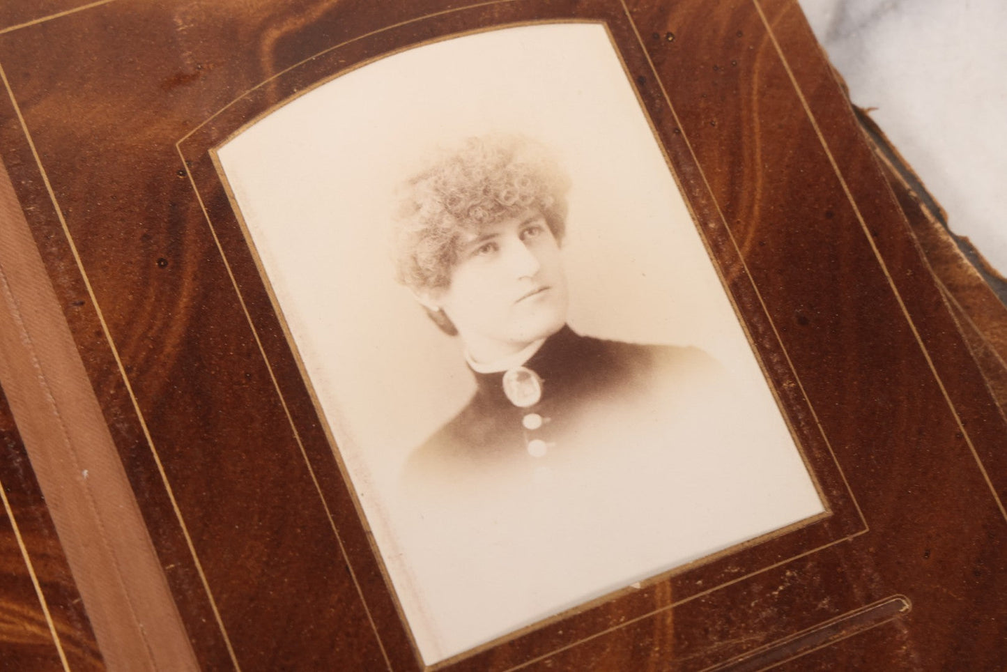 Lot 127 - Antique Brown Leather Covered Cabinet Card Family Photograph Album With 30+ Portrait Images Including Man In Fraternal Or Military Uniform, Men, Women, And Children, Note Binding Loose, Craft Grade