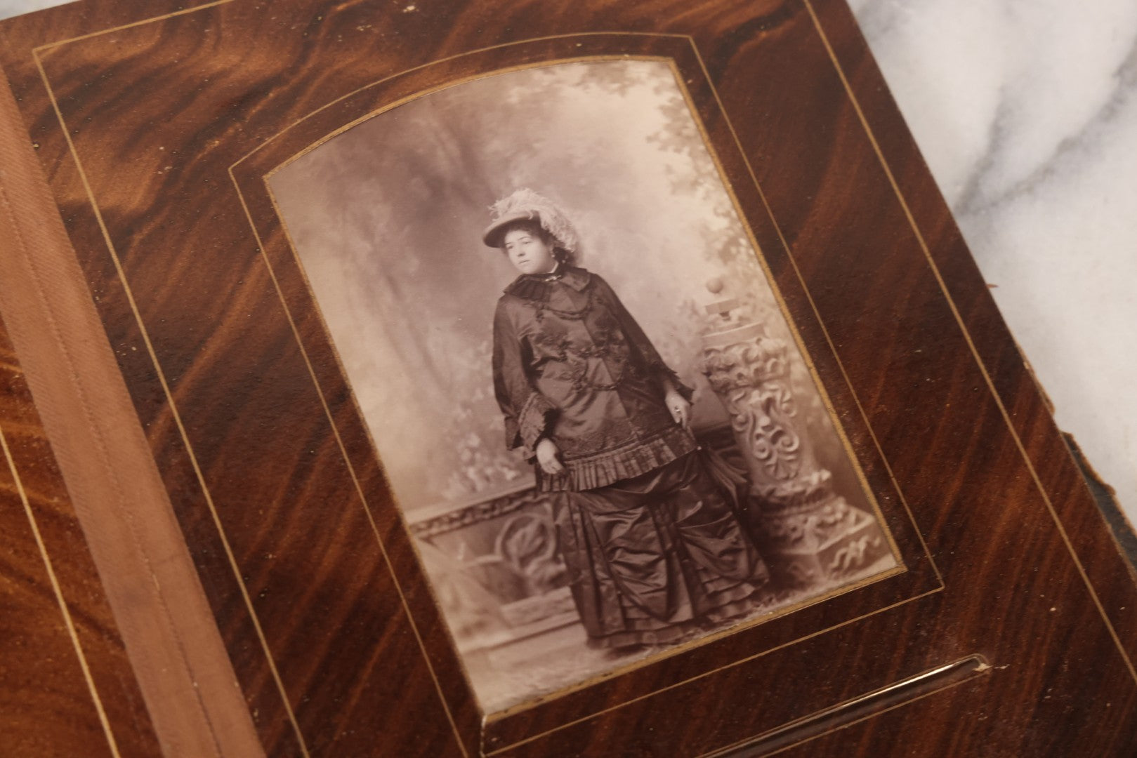 Lot 127 - Antique Brown Leather Covered Cabinet Card Family Photograph Album With 30+ Portrait Images Including Man In Fraternal Or Military Uniform, Men, Women, And Children, Note Binding Loose, Craft Grade