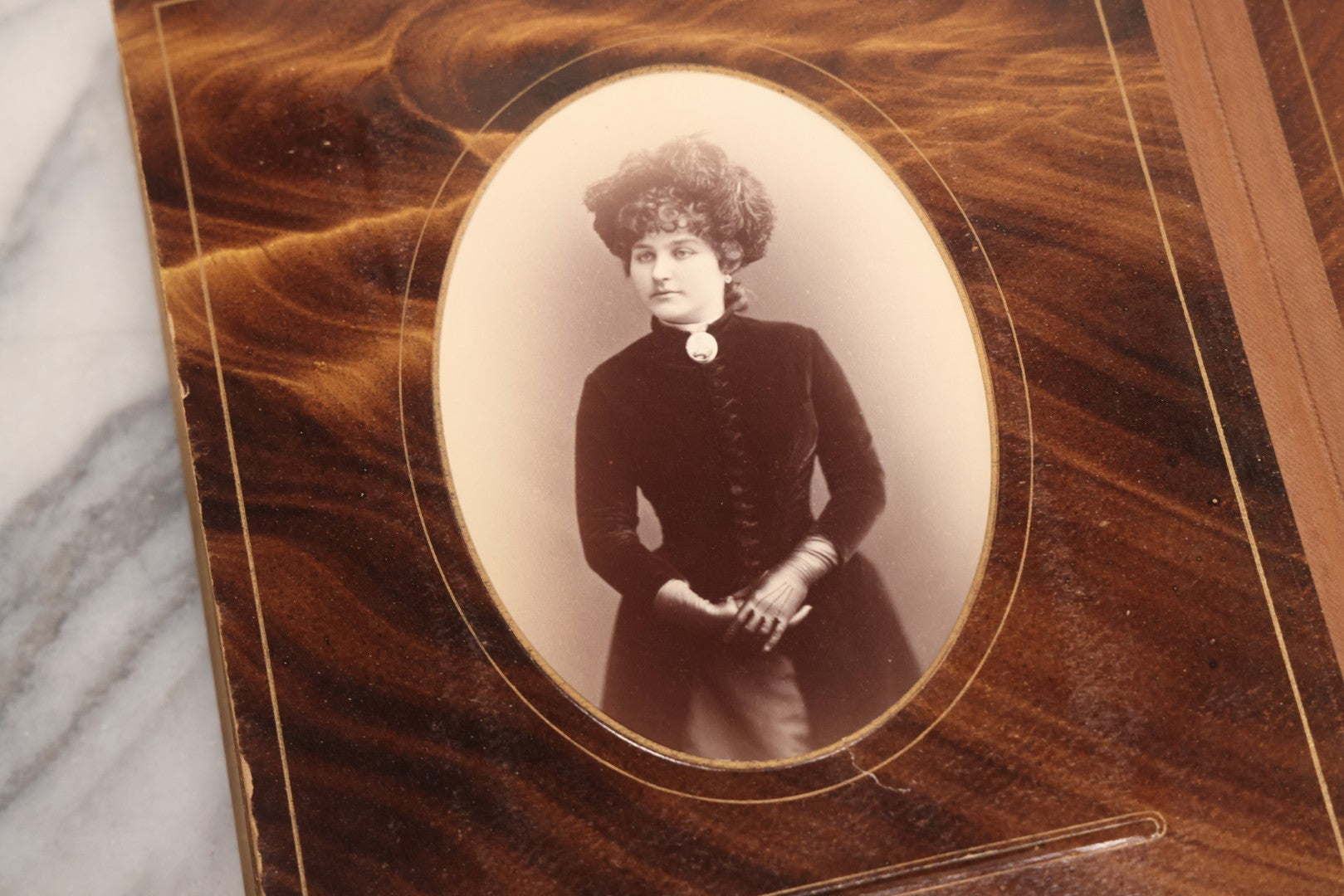 Lot 127 - Antique Brown Leather Covered Cabinet Card Family Photograph Album With 30+ Portrait Images Including Man In Fraternal Or Military Uniform, Men, Women, And Children, Note Binding Loose, Craft Grade