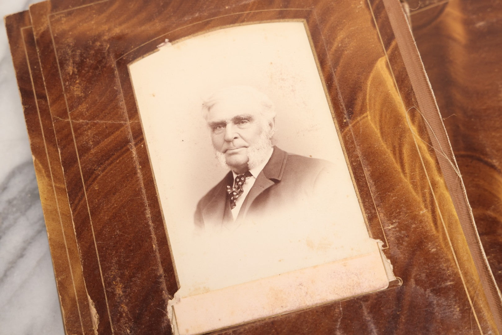 Lot 127 - Antique Brown Leather Covered Cabinet Card Family Photograph Album With 30+ Portrait Images Including Man In Fraternal Or Military Uniform, Men, Women, And Children, Note Binding Loose, Craft Grade