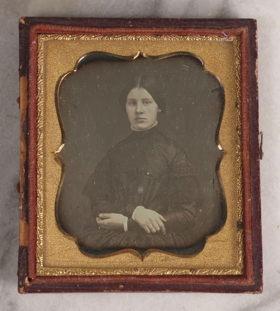 Lot 128 - Antique 1/6th Plate Daguerreotype Photograph Of Young Married Woman Posed In Dark Clothing With Crossed Arms Identified As Alice C. Brooks In Half Leatherette Case