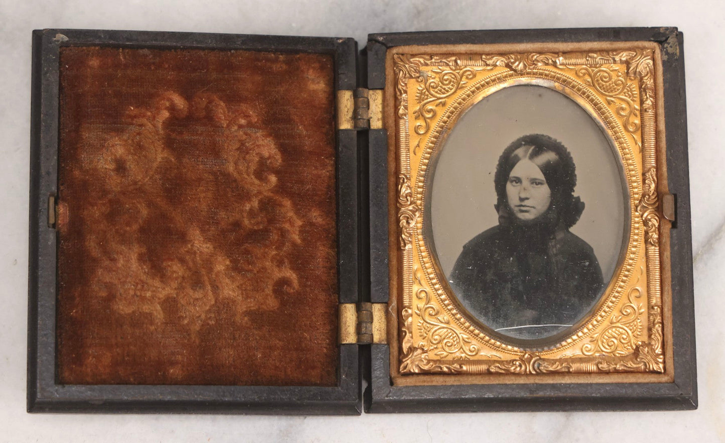 Lot 130 - Antique 1/9th Plate Ambrotype Photograph Of Young Woman In Dark Clothing With Bonnet In Thermoplastic Full Case By S. Peck & Co.