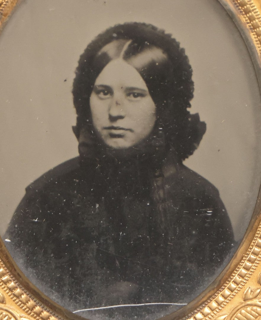 Lot 130 - Antique 1/9th Plate Ambrotype Photograph Of Young Woman In Dark Clothing With Bonnet In Thermoplastic Full Case By S. Peck & Co.